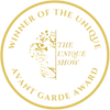 Gold circular badge with text 'Winner of the Unique Avant Garde Award' on a white background